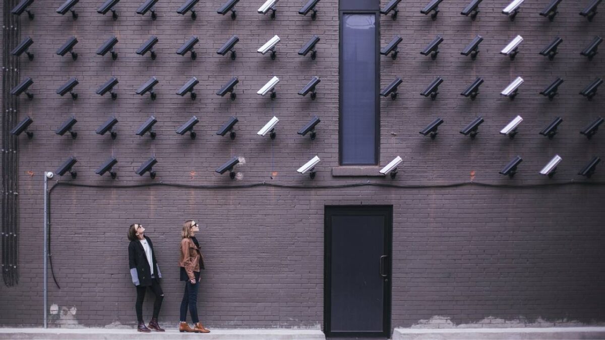 A lot of security cameras pointed at two people