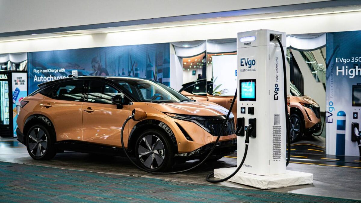 An electric vehicle getting charged