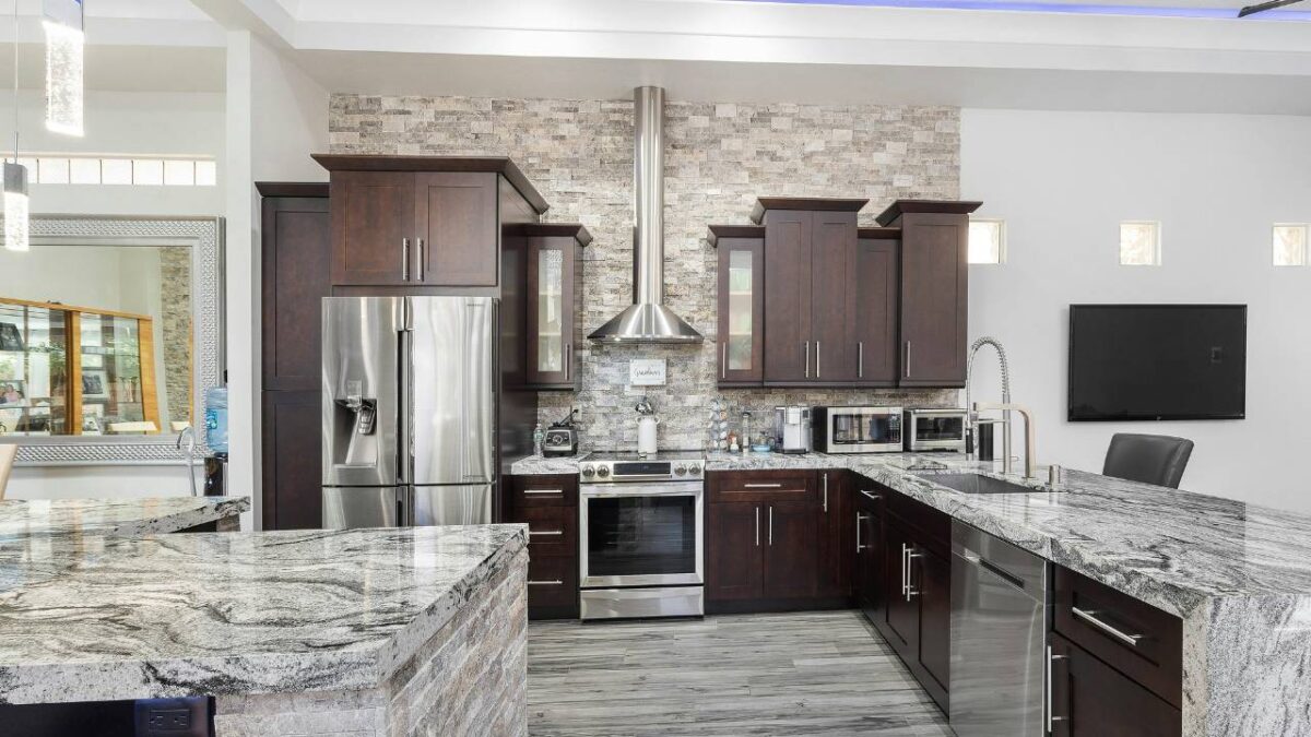 A contemporary kitchen with marble elements